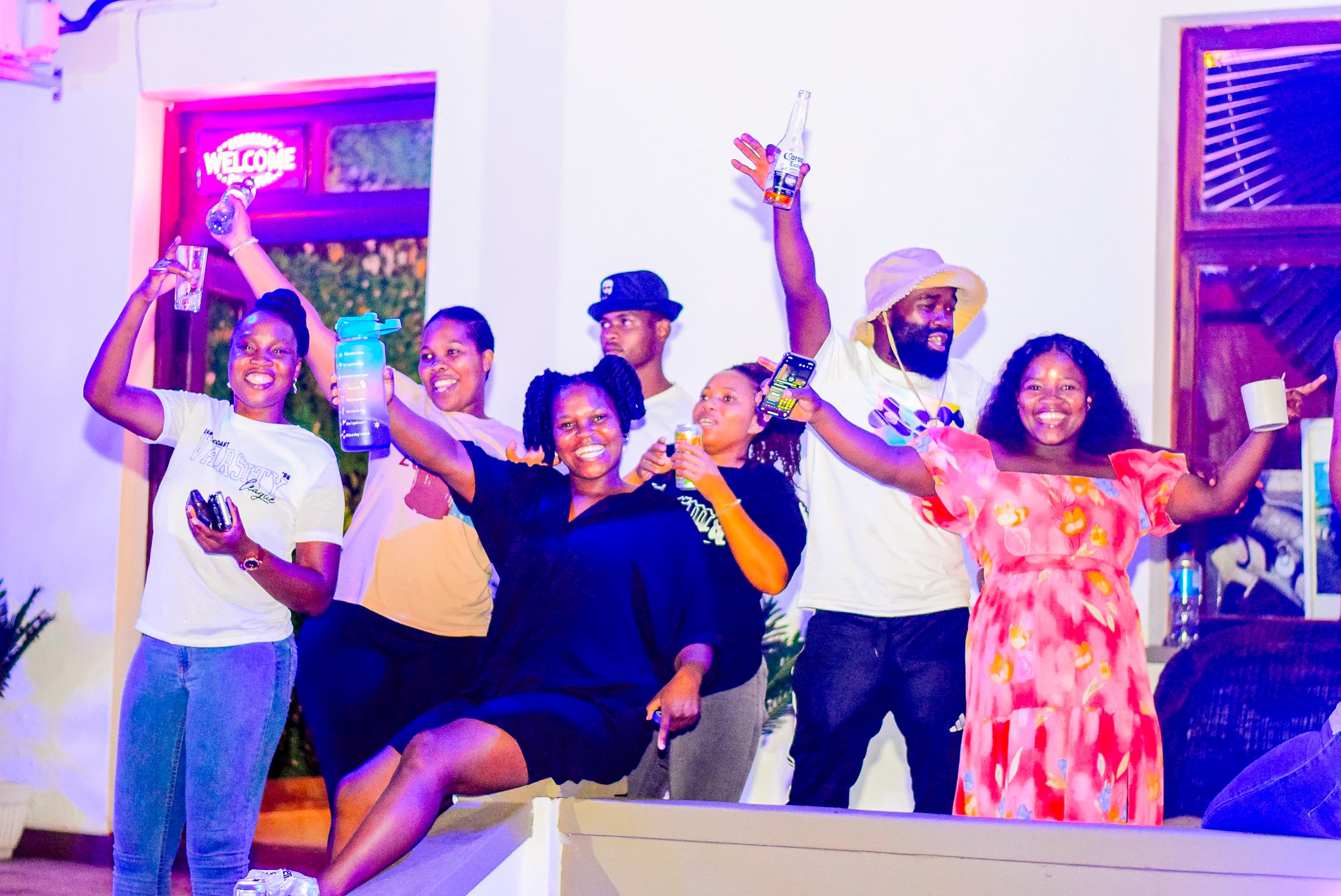 Hotel staff greeting guests with a warm smile